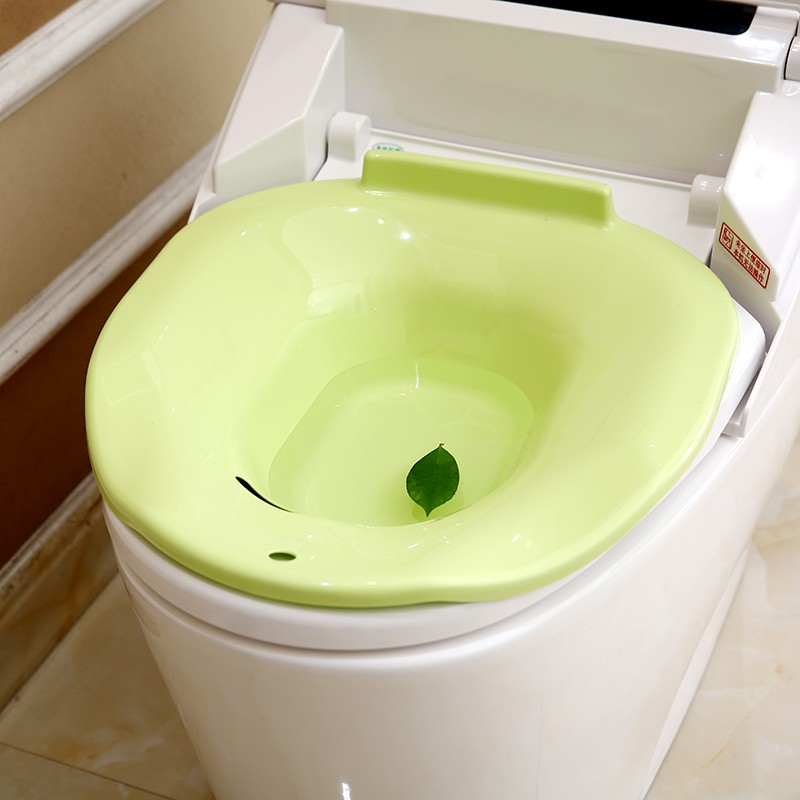 Pregnant women flushing bidet