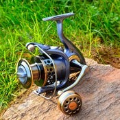 DR7000 Metal Spinning Fishing Reel Left/Right Retrieve 5.2:1 12 Ball Bearings