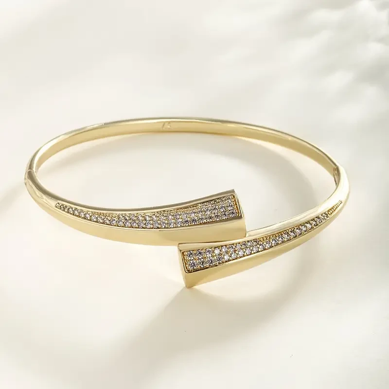 XUPING JEWELry Elegant Golden-Tone Bangle with Sparkling Cubic Zirconia