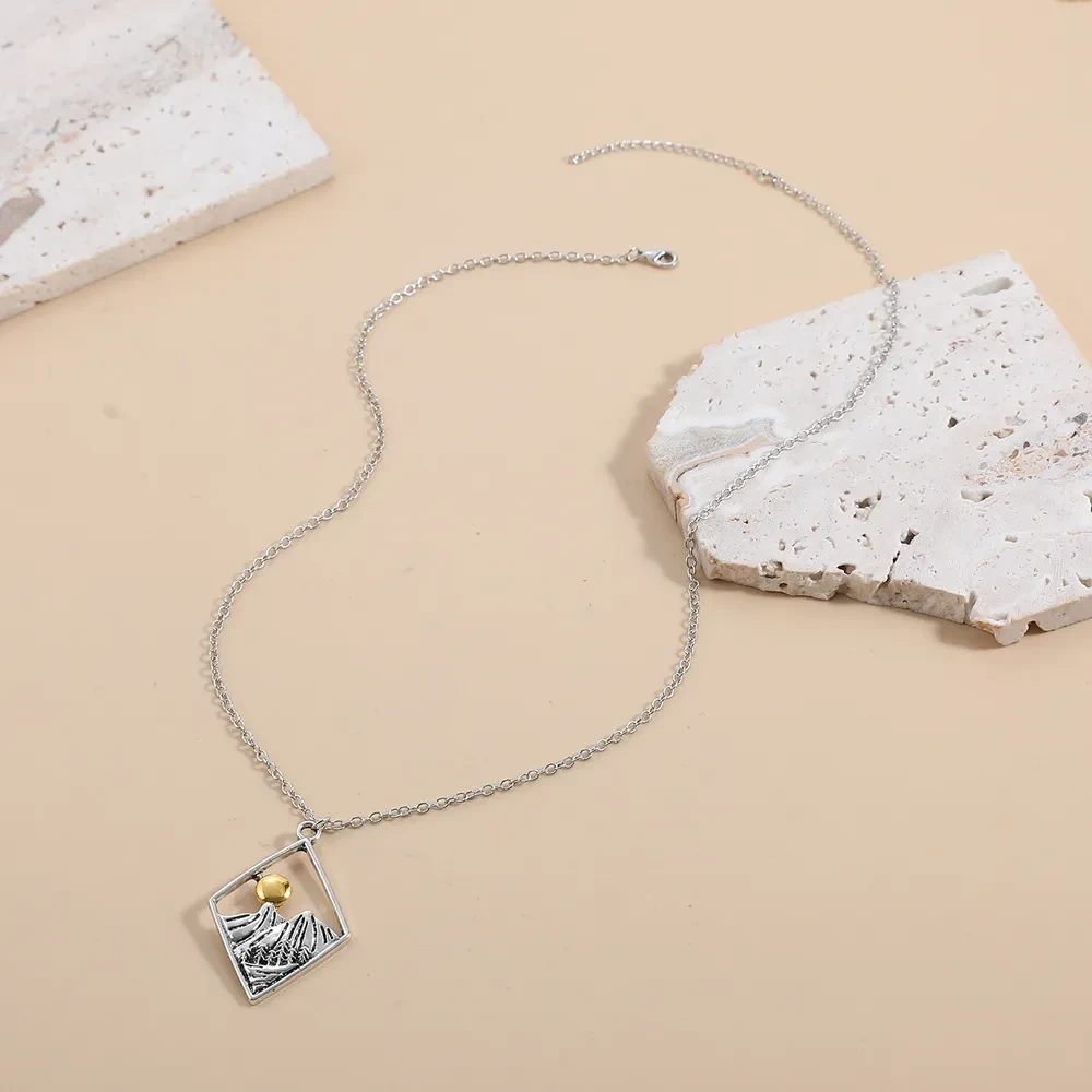 Hollow Sun Mountain Alloy Pendant Necklace