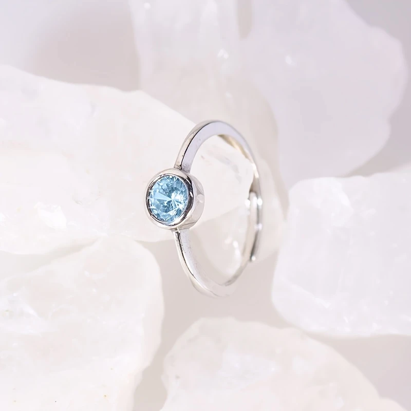 Sterling Silvery Charm Ring with Sparkling Blue Zirconia  Elegant Design for Women, Perfect for Daily Wear and Special Occasions