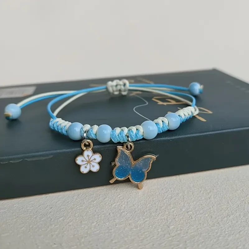 MANFANST Adjustable Handmade Braided Bracelet for Women: A Boho Chic Accessory with a Playful Twist