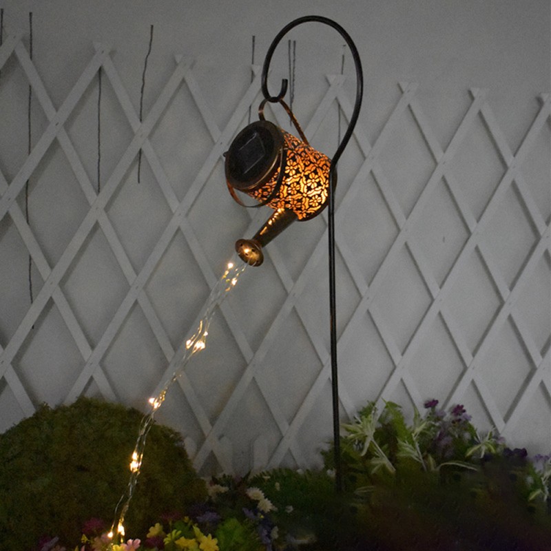 Watering Can With Lights Pouring Out